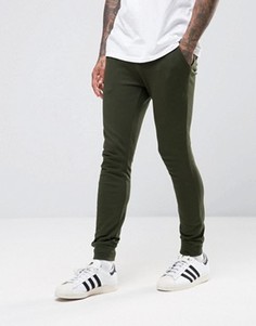 Супероблегающие спортивные штаны цвета хаки ASOS - Зеленый