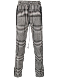 Represent checkered track trousers