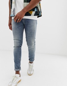 Выбеленные зауженные джинсы со вставками United Colors Of Benetton - Синий