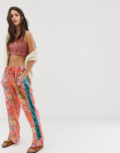 Свободные брюки с цветочным принтом и бархатными полосами по бокам Aratta - Красный