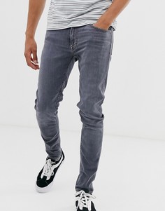 Серые суженные книзу джинсы Tiger Of Sweden Jeans Evolve - Серый