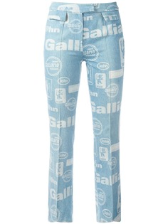 John Galliano Pre-Owned расклешенные джинсы с принтом Galliano Team