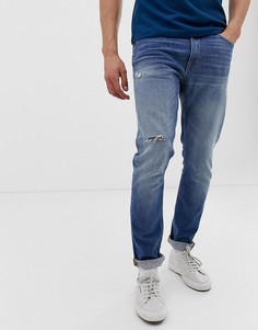 Светлые зауженные джинсы с рваной отделкой Tiger of Sweden Jeans-Синий