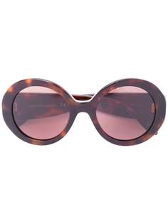 Alexander McQueen Eyewear солнцезащитные очки в круглой оправе с заклепками