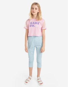 Голубые зауженные брюки для девочки Gloria Jeans