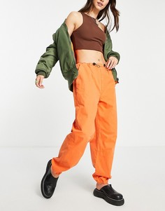 Ярко-оранжевые брюки карго в стиле 90-х с пуговицами «моржовый клык» ASOS DESIGN-Оранжевый цвет