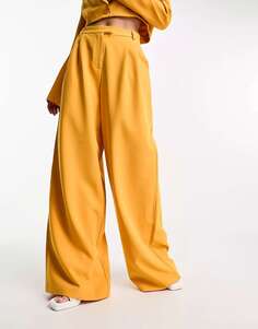 Оранжевые широкие брюки с напуском Kyo The Brand